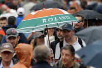 Úsmev i slzy na Roland Garros
